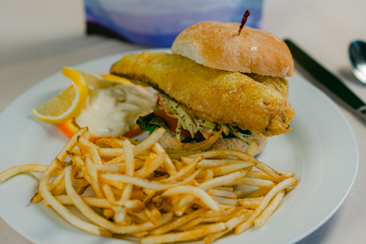 Featured image for “Slawed & Tartered Battered White Bass Sandwich”
